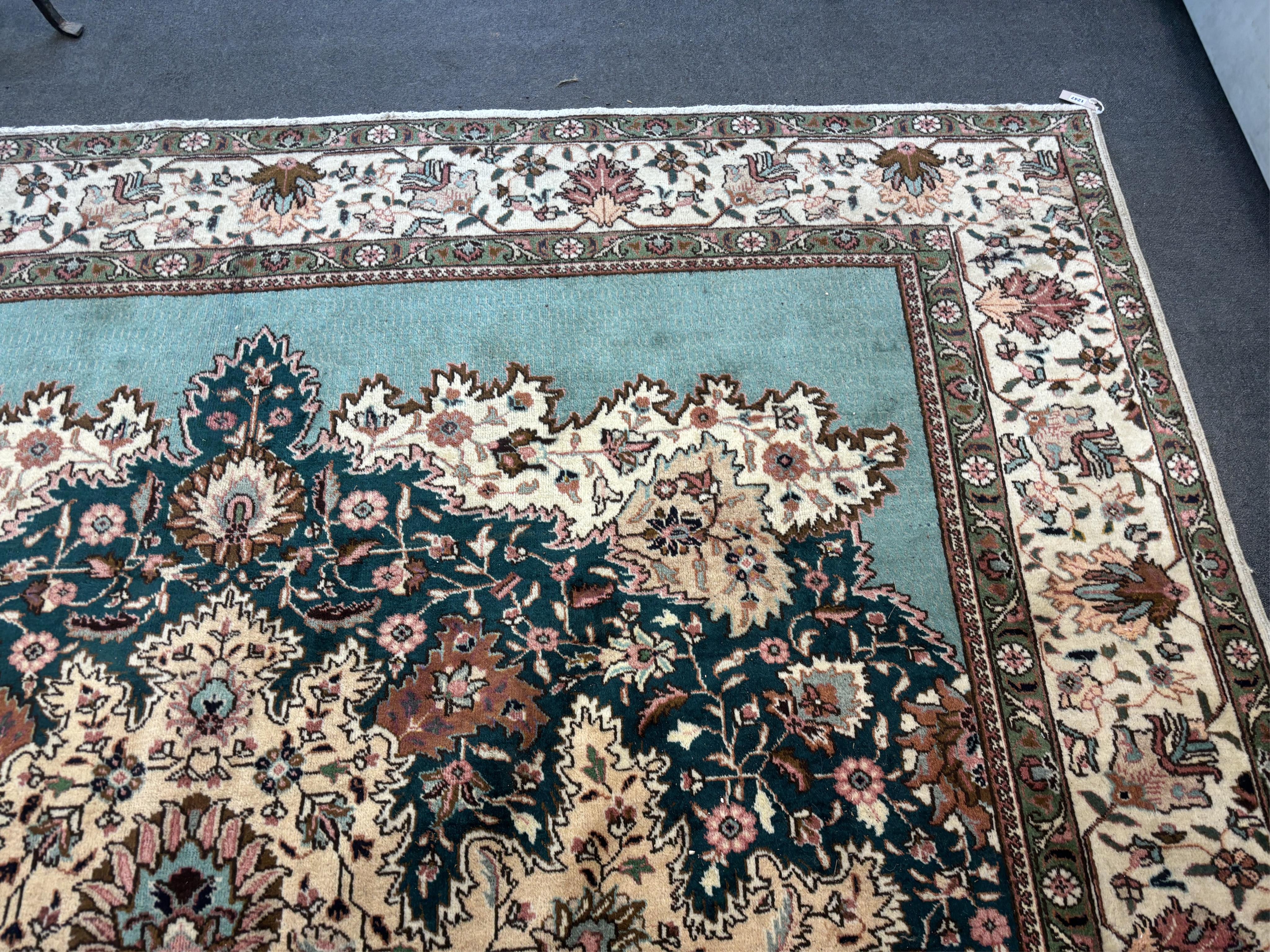 A Tabriz carpet, 400 x 310cm